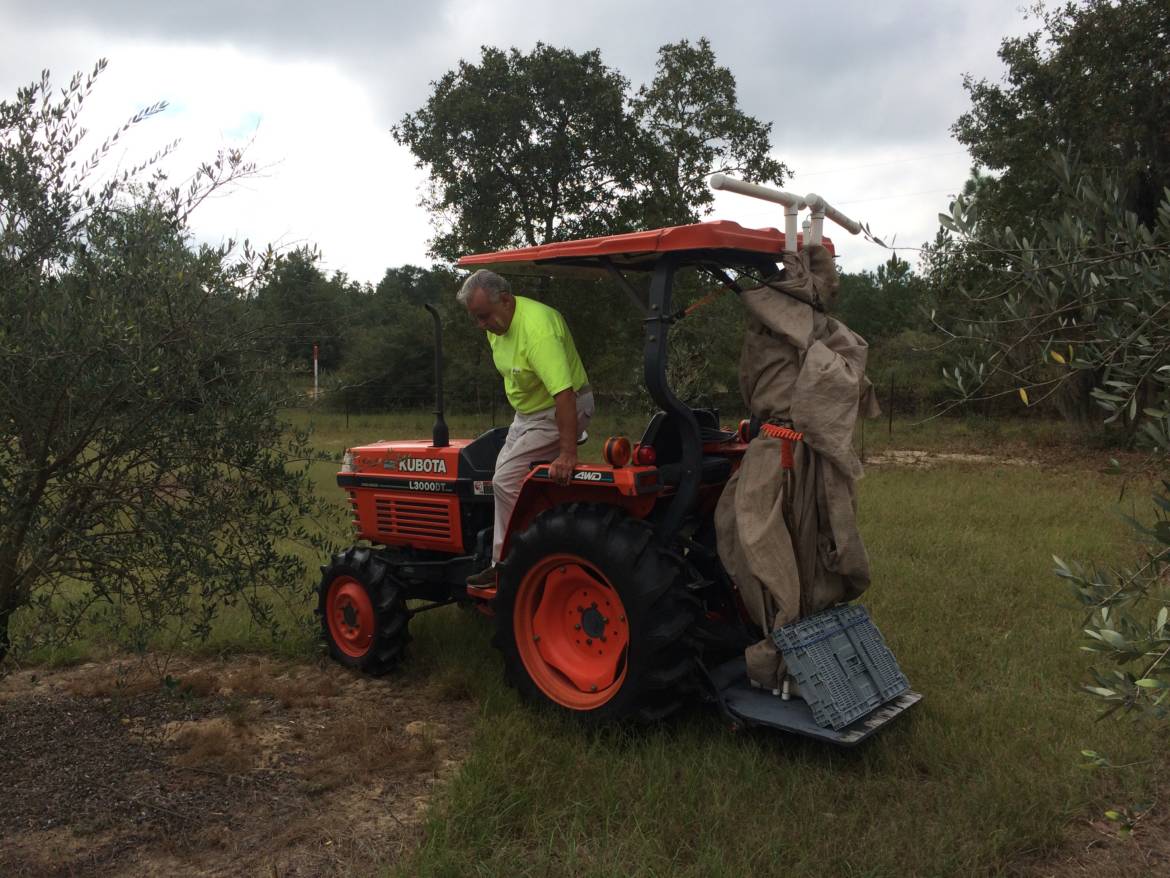 Mueller-on-tractor-sets-up-net.jpg